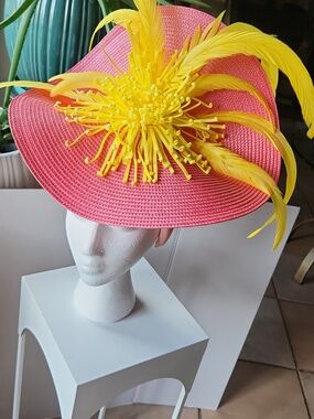 Women's Pink Fascinator Hat with Bold Yellow Feather Accents